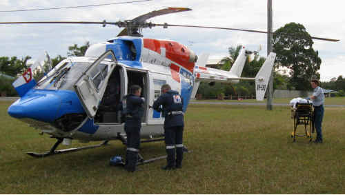 A Cooloola Cove man is loaded into the AGL Action Rescue chopper yesterday after severely injuring his right hand while using a circular saw. A Cooloola Cove man is loaded into the AGL Action Rescue chopper yesterday after severely injuring his right hand while using a circular saw.